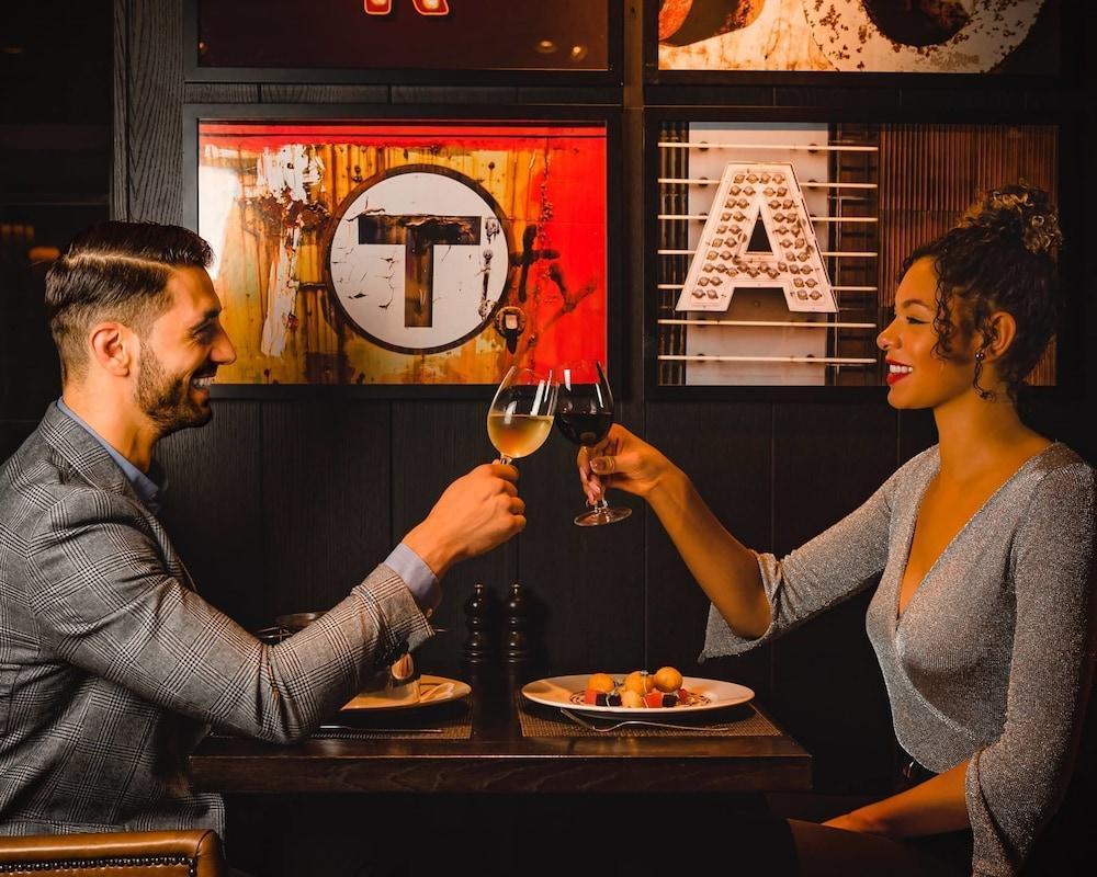 Dakota Leeds Hotel Leeds  Exterior photo A couple toasting with wine